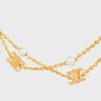 Triomphe Pearl dubbelhalsband i mässing med guldfinish och pärlor av harts