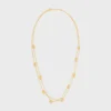 Triomphe Pearl dubbelhalsband i mässing med guldfinish och pärlor av harts Triomphe Pearl dubbelhalsband i mässing med guldfinish och pärlor av harts