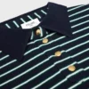 Triomphe-polo i randig jersey