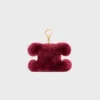 Triomphe Pom-Pom-berlock i broderat fårskinn och kalvskinn Triomphe Pom-Pom-berlock i broderat fårskinn och kalvskinn