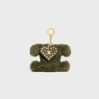 Triomphe Pom-Pom-berlock i fårskinn och kalvskinn Triomphe Pom-Pom-berlock i fårskinn och kalvskinn