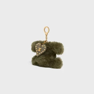 Triomphe Pom-Pom-berlock i fårskinn och kalvskinn Triomphe Pom-Pom-berlock i fårskinn och kalvskinn