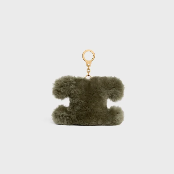 Triomphe Pom-Pom-berlock i fårskinn och kalvskinn Triomphe Pom-Pom-berlock i fårskinn och kalvskinn