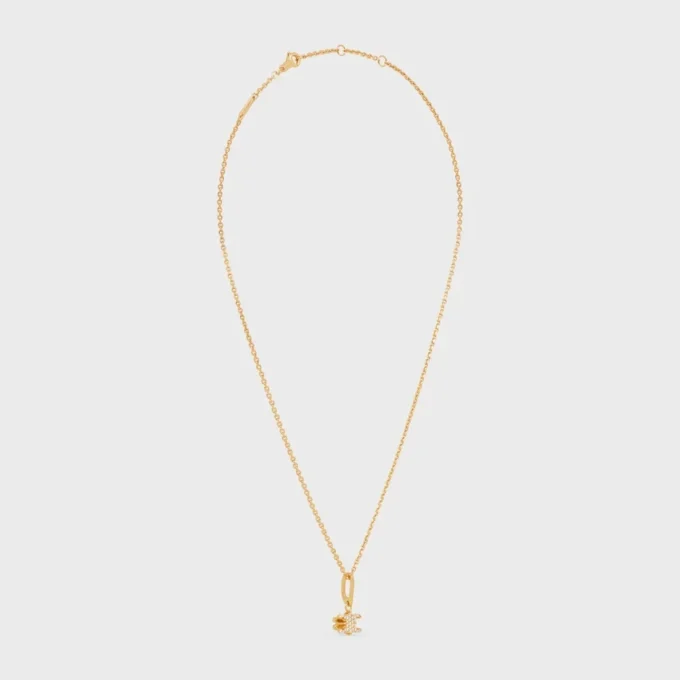 Triomphe Solitaire Sparkle-halsband i strass och mässing med guldfinish Triomphe Solitaire Sparkle-halsband i strass och mässing med guldfinish