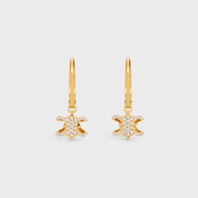 Triomphe Solitaire Sparkle örhängen i strass och mässing med guldfinish Triomphe Solitaire Sparkle örhängen i strass och mässing med guldfinish