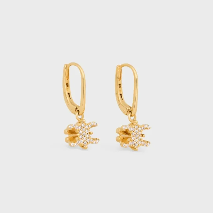 Triomphe Solitaire Sparkle örhängen i strass och mässing med guldfinish Triomphe Solitaire Sparkle örhängen i strass och mässing med guldfinish
